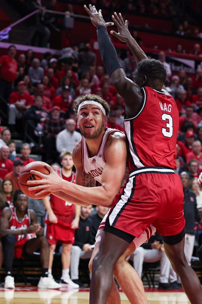 Indiana Hoosiers forward Race Thompson (25) looks to shoot as Rutgers Scarlet Knights forward Mawot Mag (3) defends during the first half at Jersey Mike's Arena